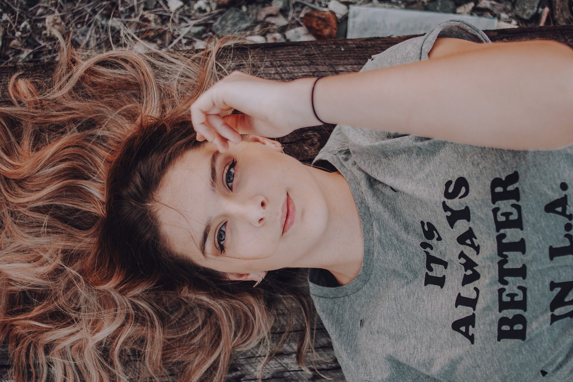 A woman with a confident expression, embodying the passionate and energetic traits associated with Aries.